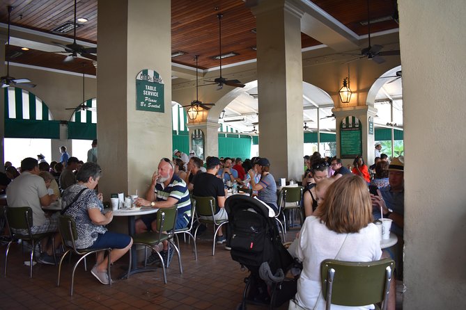 French Quarter Historical Sights and Stories Walking Tour - Stop 2: French Market and the human story behind the crowds
