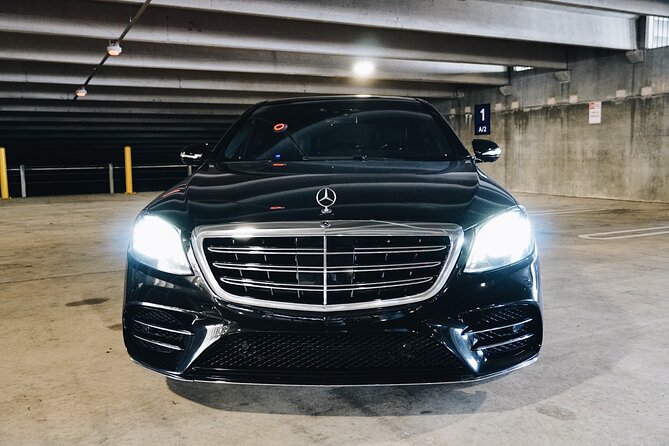 New Orleans Arrival Chauffeur Driven Transport - On the Road in New Orleans: A/C Comfort and Helpful Chauffeur Energy