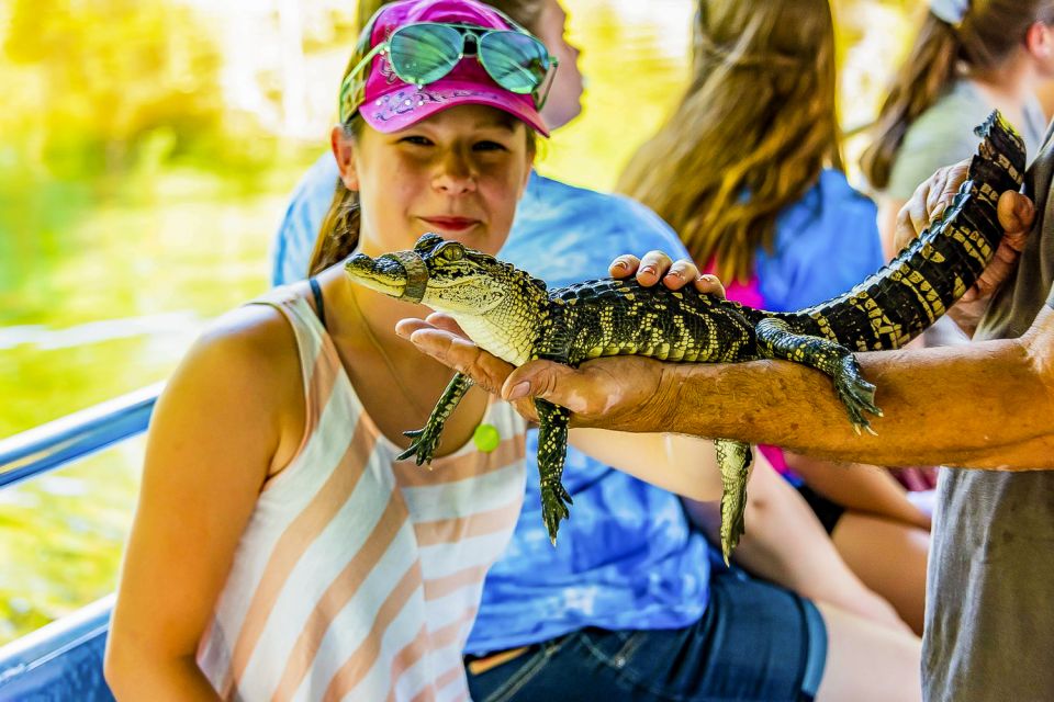 New Orleans: Bayou Swamp Tour and Oak Alley Plantation Tour - Cajun Pride’s swamp boat tour on a covered flat-bottom boat
