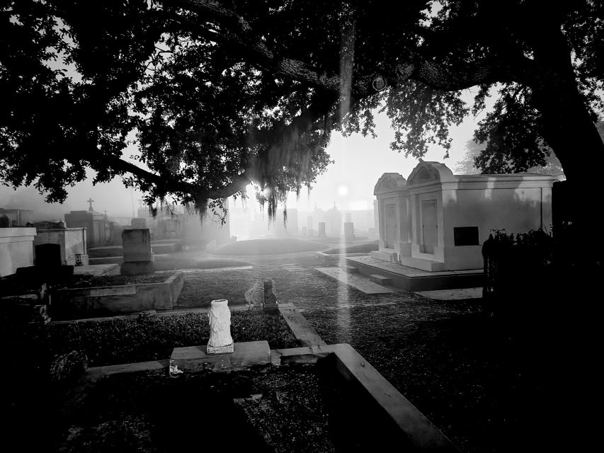 New Orleans: Cemetery Bus Tour At Dark with Exclusive Access - French Quarter Start: Passing Landmarks While You Get the Story Set Up