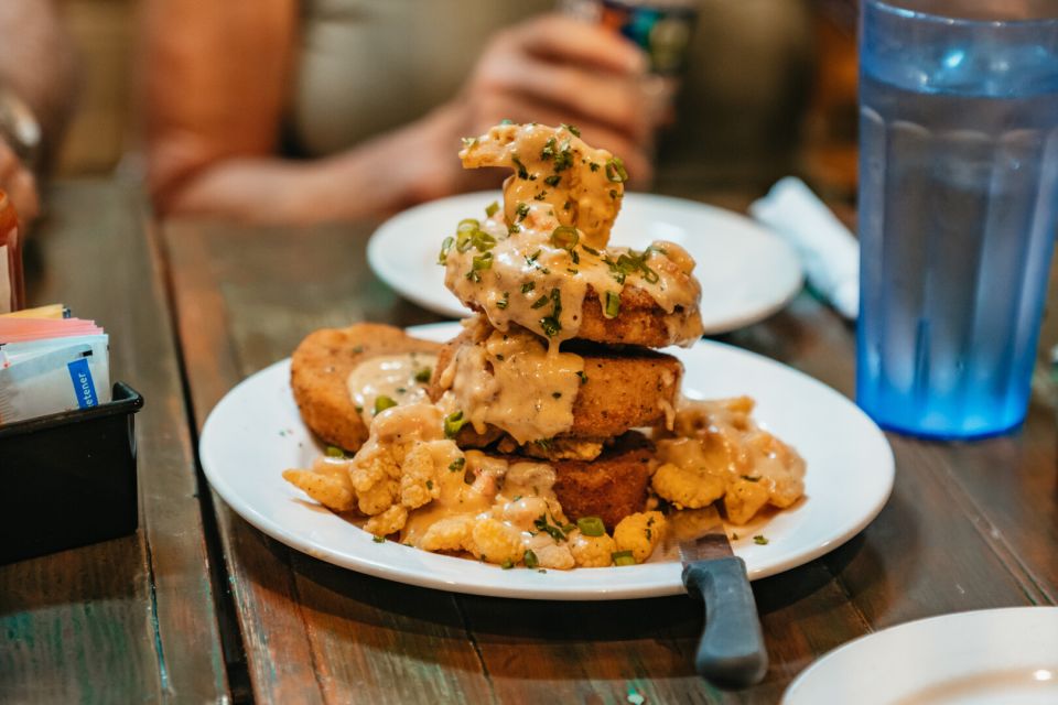 New Orleans: Garden District Food, Drinks & History Tour - Stop 2: Cajun Connection and a Savory Middle Act