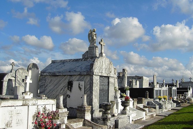 New Orleans Small-Group City and Cemetery Tour with Hotel Pickup - World War II Museum and big-city landmarks: the quick bus-window pass