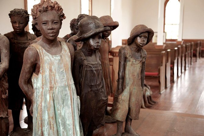 Whitney Plantation Tour with Transportation from New Orleans - The grounds you’ll see: slave cabins, the Big House, and preserved architecture